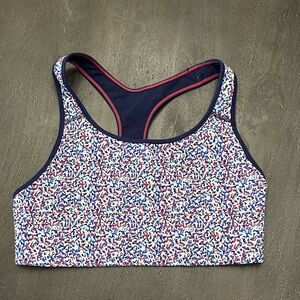 Women’s Racerback Sports Bra - Blue/Red Confetti Print